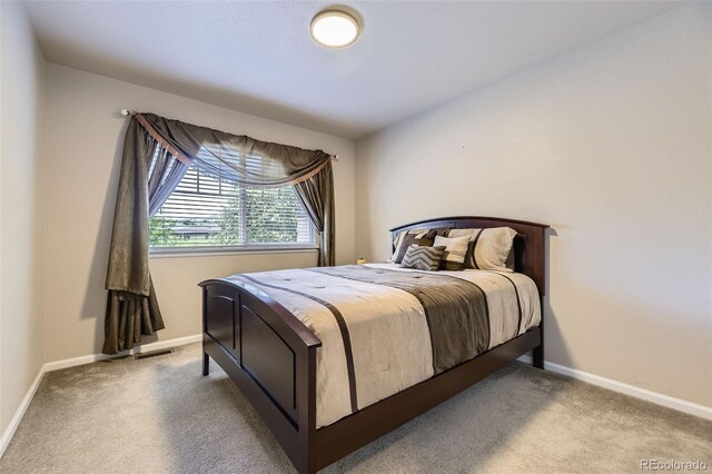3490 Craftsbury Dr, Highlands Ranch, CO 80126 - carpeted bedroom with baseboards