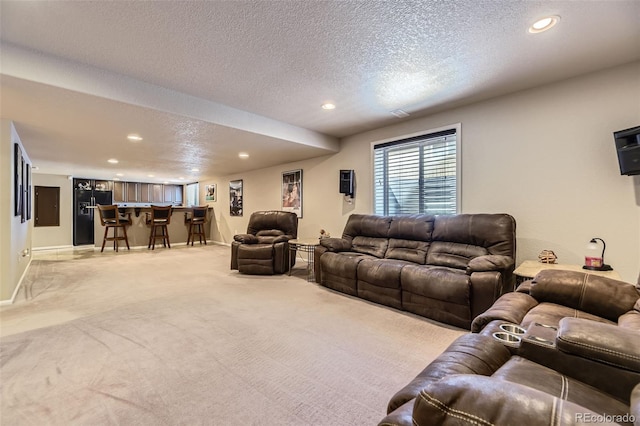 3490 Craftsbury Dr, Highlands Ranch, CO 80126 - living area with bar area, light carpet, recessed lighting, and a textured ceiling