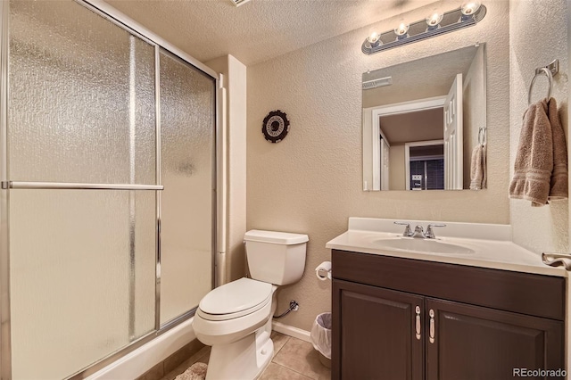 3490 Craftsbury Dr, Highlands Ranch, CO 80126 - bathroom with vanity, a stall shower, a textured wall, a textured ceiling, and tile patterned flooring