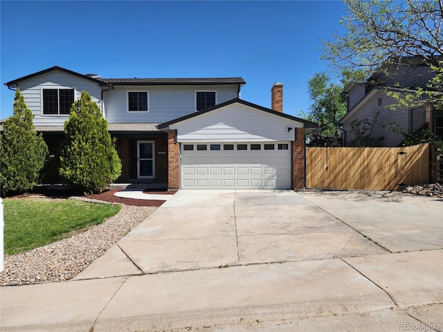 7753 W Plymouth Pl S, Littleton, CO 80128 - traditional-style house with a garage, fence, driveway, brick siding, and a chimney