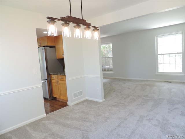7753 W Plymouth Pl S, Littleton, CO 80128 - spare room with carpet and baseboards