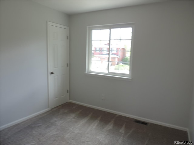 7753 W Plymouth Pl S, Littleton, CO 80128 - carpeted empty room featuring baseboards