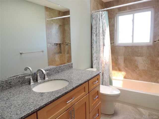 7753 W Plymouth Pl S, Littleton, CO 80128 - bathroom featuring shower / tub combo, toilet, and vanity