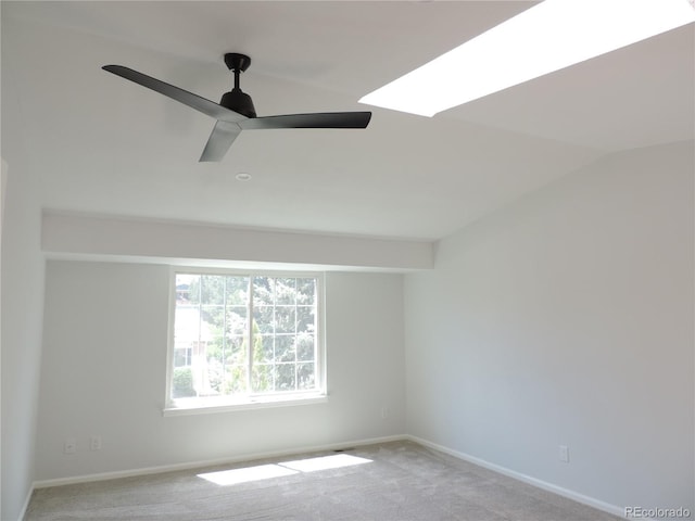 7753 W Plymouth Pl S, Littleton, CO 80128 - unfurnished room with light colored carpet, lofted ceiling, ceiling fan, and baseboards