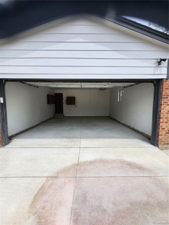 7753 W Plymouth Pl S, Littleton, CO 80128 - garage featuring driveway