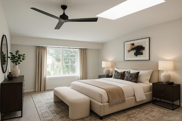 7753 W Plymouth Pl S, Littleton, CO 80128 - bedroom with carpet, ceiling fan, and a skylight