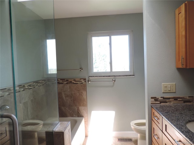 7753 W Plymouth Pl S, Littleton, CO 80128 - full bathroom with a shower, vanity, a tub to relax in, and tile patterned floors