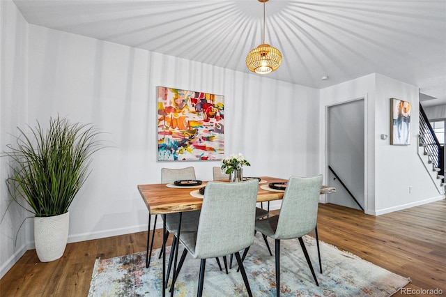 dining room with hardwood / wood-style floors