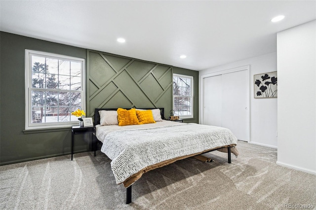 carpeted bedroom featuring a closet