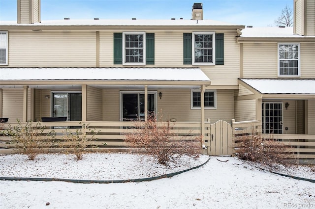 view of snow covered property