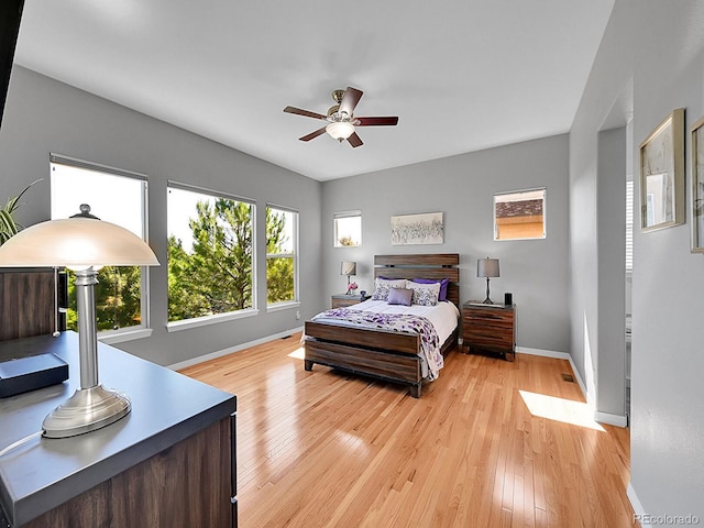 5309 W Hoover Dr, Littleton, CO 80123 - bedroom with light wood-style floors and ceiling fan