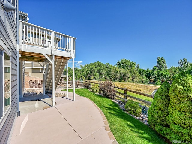 5309 W Hoover Dr, Littleton, CO 80123 - view of patio with stairs and a wooden deck
