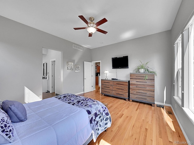 5309 W Hoover Dr, Littleton, CO 80123 - bedroom with light wood-style floors and a ceiling fan