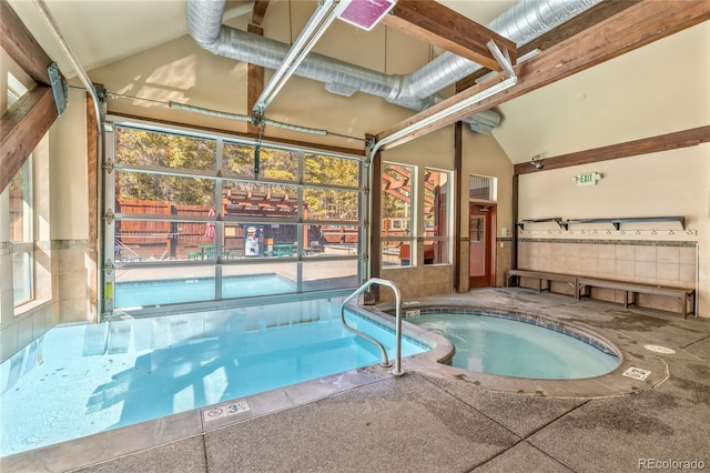 pool with an indoor in ground hot tub