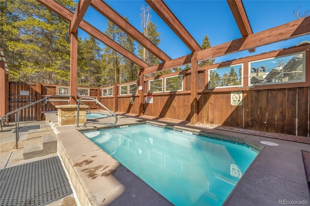 view of swimming pool with a patio area, a fenced backyard, and a fenced in pool