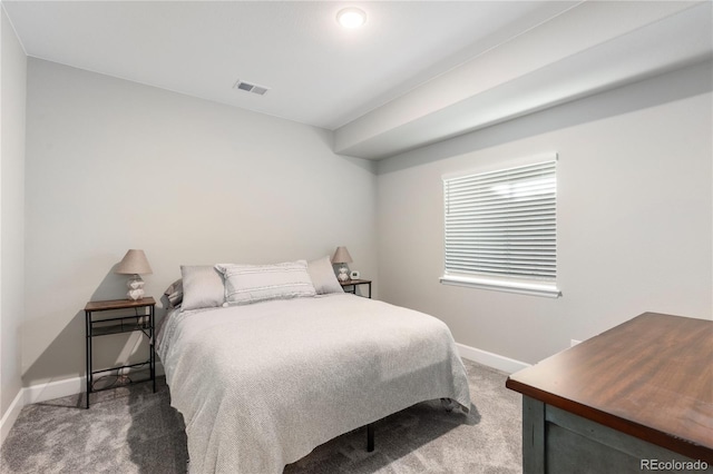 bedroom with carpet flooring, visible vents, and baseboards