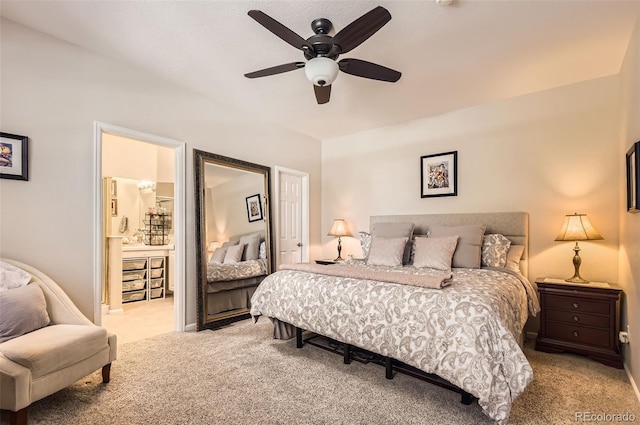 601 Clarendon Loop, Castle Pines, CO 80108 - bedroom with light colored carpet, ceiling fan, and ensuite bath