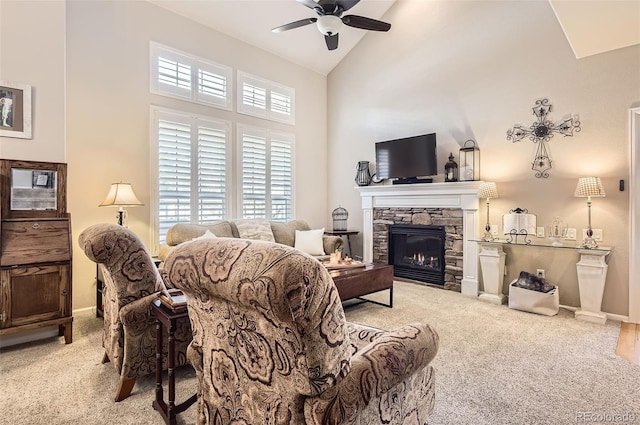 601 Clarendon Loop, Castle Pines, CO 80108 - carpeted living area featuring ceiling fan, a fireplace, and high vaulted ceiling