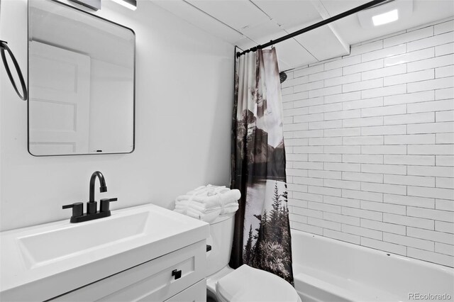 1554 N Pennsylvania St, Denver, CO 80203 - full bath with toilet, shower / tub combo with curtain, and vanity