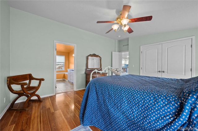 235 Blazing Saddle Trl, Cotopaxi, CO 81223 - bedroom featuring wood finished floors, a closet, baseboards, ceiling fan, and ensuite bath
