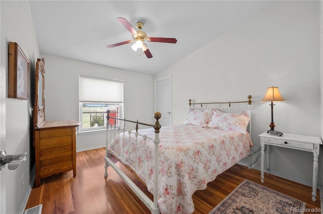 235 Blazing Saddle Trl, Cotopaxi, CO 81223 - bedroom with wood finished floors, baseboards, and a ceiling fan