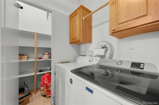 235 Blazing Saddle Trl, Cotopaxi, CO 81223 - laundry room featuring cabinet space, washer and clothes dryer, and light floors
