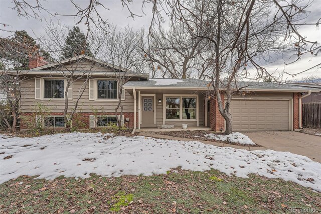 split level home with a garage