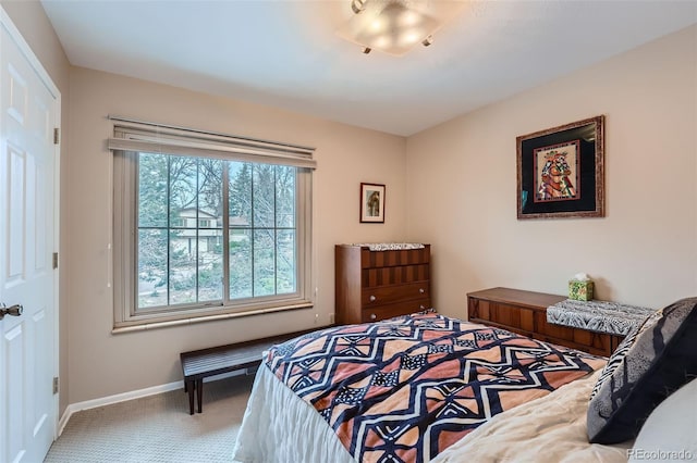 bedroom featuring carpet