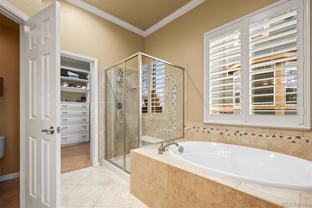 bathroom with ornamental molding and independent shower and bath