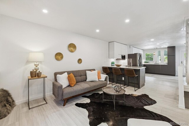 2059 S Balsam St, Lakewood, CO 80227 - living area with recessed lighting and baseboards