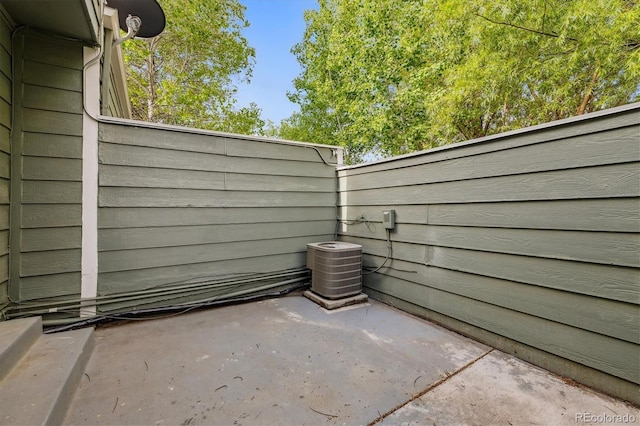 2059 S Balsam St, Lakewood, CO 80227 - view of patio featuring cooling unit