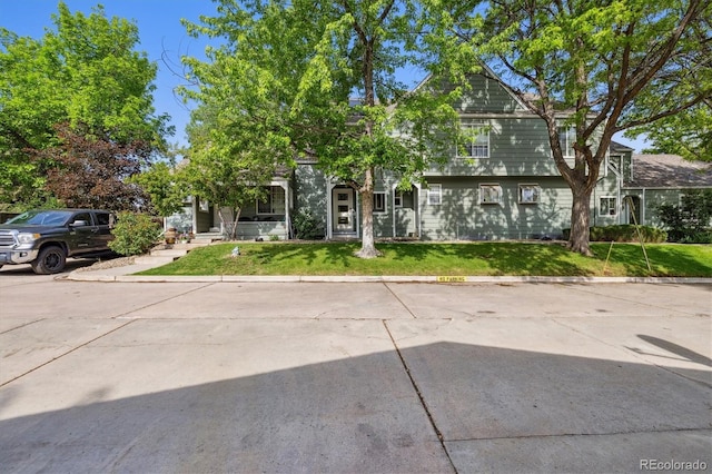 2059 S Balsam St, Lakewood, CO 80227 - view of front of home featuring a front lawn