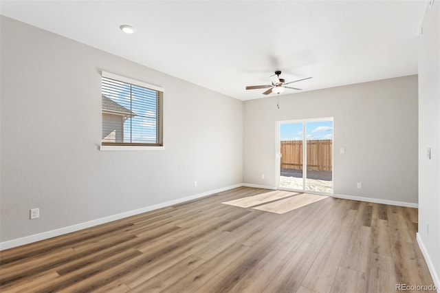 9376 Yampa Ct, Commerce City, CO 80022 - empty room with baseboards, a ceiling fan, and wood finished floors