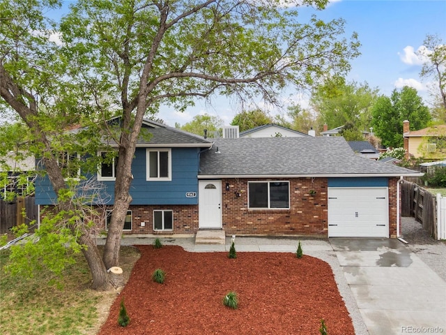 split level home featuring a garage