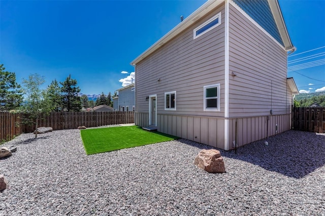201 S Boundary St, Woodland Park, CO 80863 - rear view of property featuring a fenced backyard and a patio area