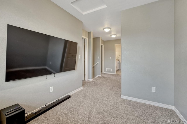 201 S Boundary St, Woodland Park, CO 80863 - corridor with carpet flooring, attic access, and an upstairs landing