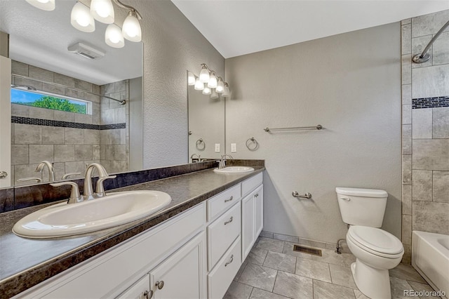 201 S Boundary St, Woodland Park, CO 80863 - bathroom with double vanity and tiled shower / bath