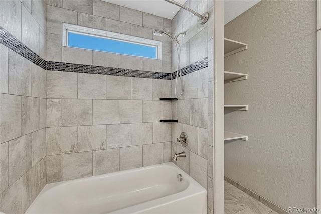 201 S Boundary St, Woodland Park, CO 80863 - full bath with shower / washtub combination and a textured wall