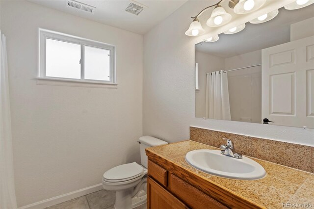 5425 County Road 32 Unit 14, Mead, CO 80504 - full bathroom with vanity, tile patterned flooring, toilet, a shower with curtain, and baseboards