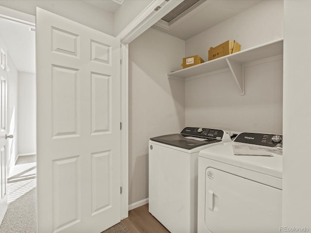 laundry area featuring washer and clothes dryer