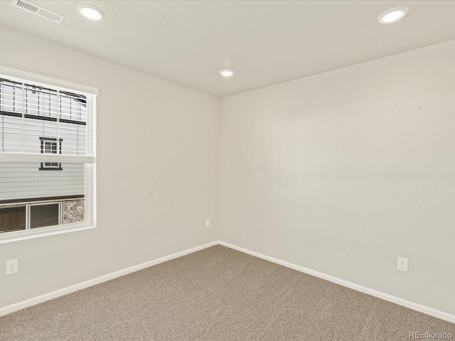 view of carpeted spare room