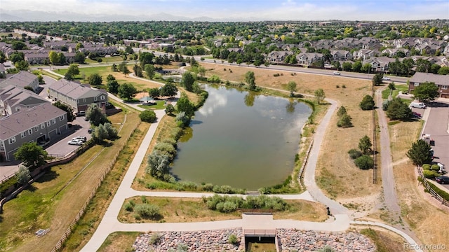 12778 Jasmine St Unit E, Thornton, CO 80602 - aerial view of property's location featuring a nearby body of water and nearby suburban area