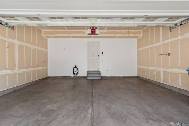 12778 Jasmine St Unit E, Thornton, CO 80602 - garage with a garage door opener