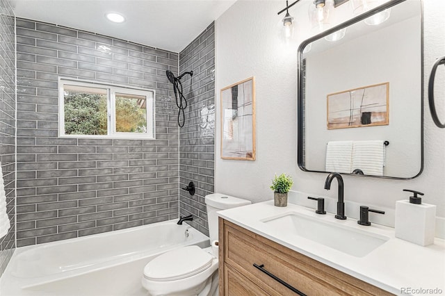 full bathroom featuring toilet, tub / shower combination, vanity, and recessed lighting