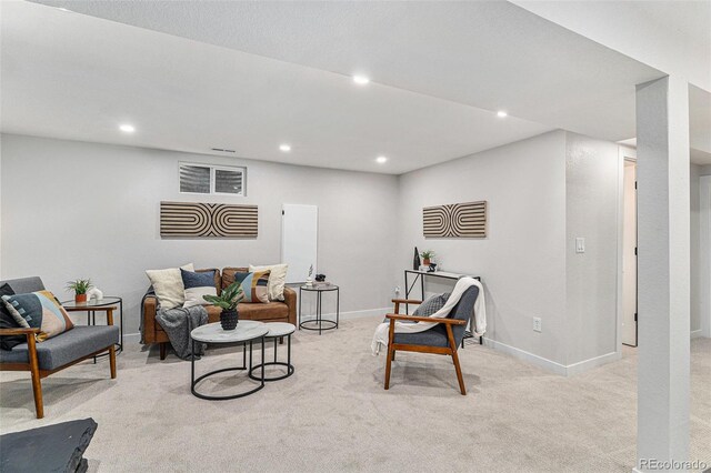 living room with light carpet, recessed lighting, and baseboards