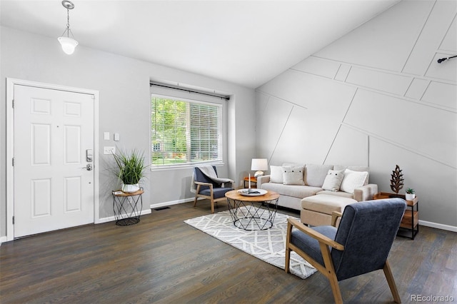 3775 Balderas St, Brighton, CO 80601 - living area featuring dark wood-style flooring and vaulted ceiling