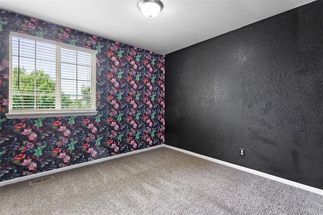 3775 Balderas St, Brighton, CO 80601 - carpeted spare room with wallpapered walls and baseboards