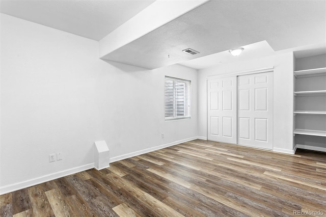 3775 Balderas St, Brighton, CO 80601 - unfurnished bedroom with wood finished floors and a closet