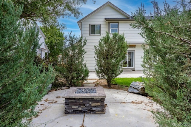 3775 Balderas St, Brighton, CO 80601 - back of property with a patio area and a fire pit
