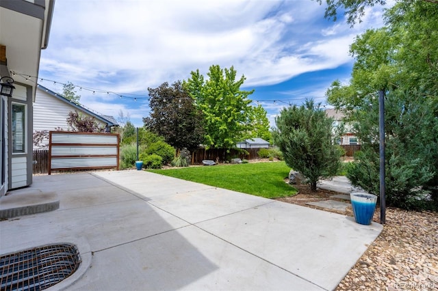 3775 Balderas St, Brighton, CO 80601 - fenced backyard with a patio area